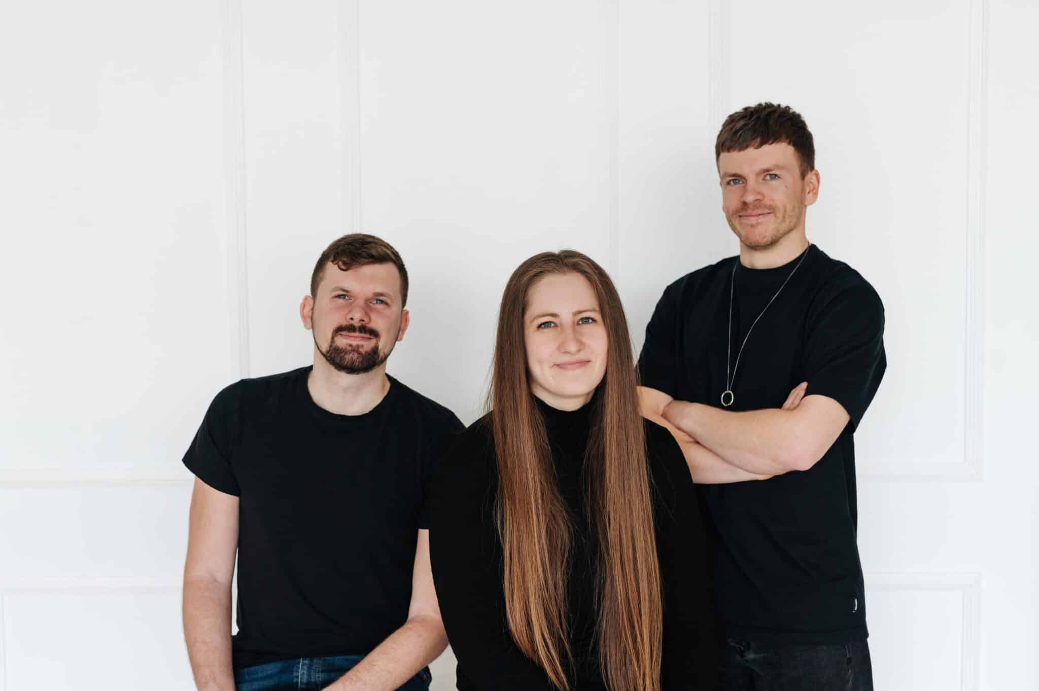 Kloosive team. Three people standing from left to right. Male, female and male.